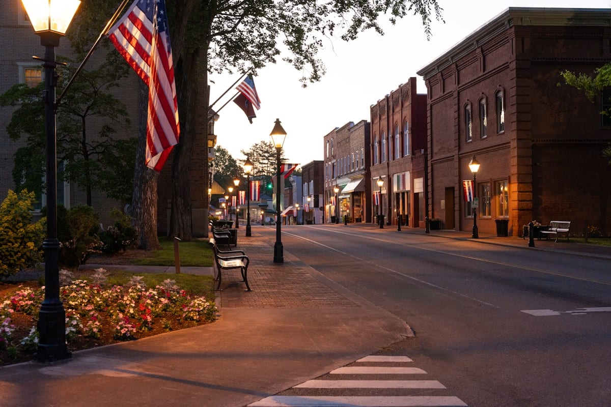 Downtown street with American flags in Roanoke, TX