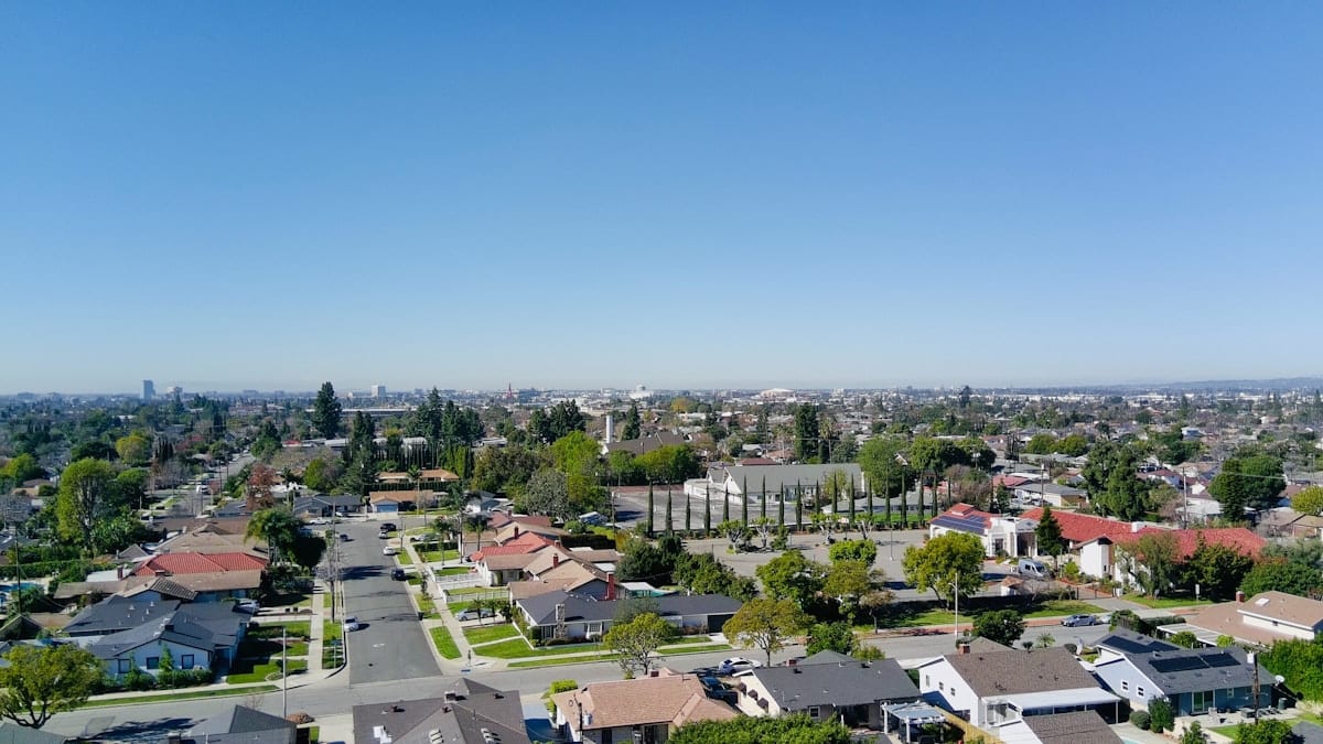 Suburban neighborhood street under a clear sky in Euless, TX